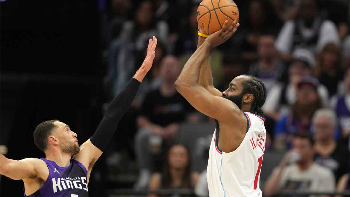 Los Angeles Clippers guard James Harden (1) shoots against Sacramento Kings guard Zach LaVine (8) during the second quarter at Golden 1 Center.