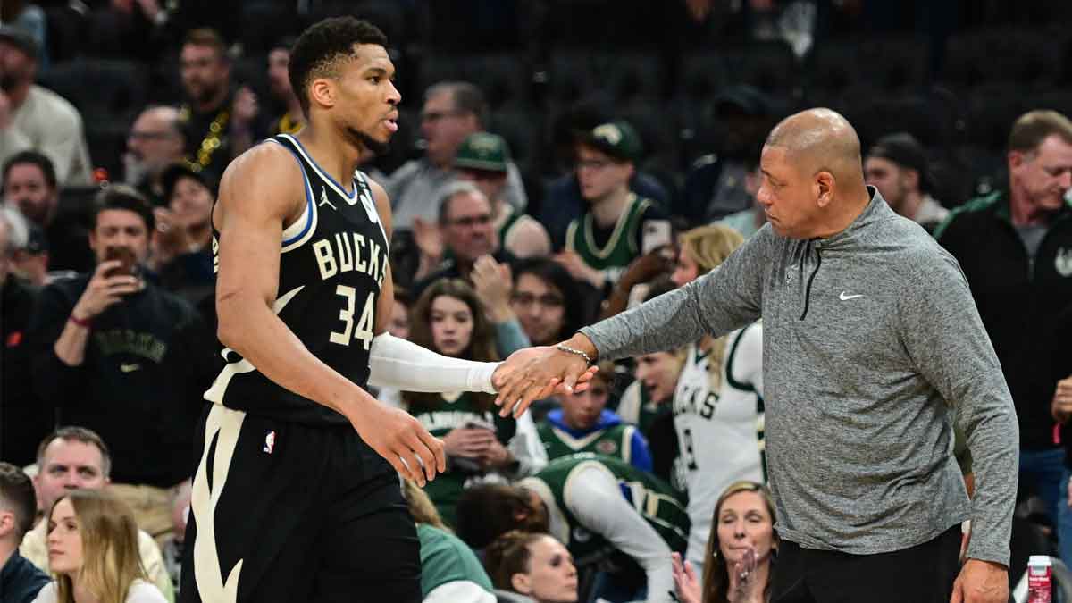 Milwaukee Bucks forward Giannis Antetokounmpo (34) exits the game in the fourth quarter as head coach Doc Rivers shakes his hand during game four against the Indiana Pacers of first round for the 2024 NBA Playoffs at Fiserv Forum.
