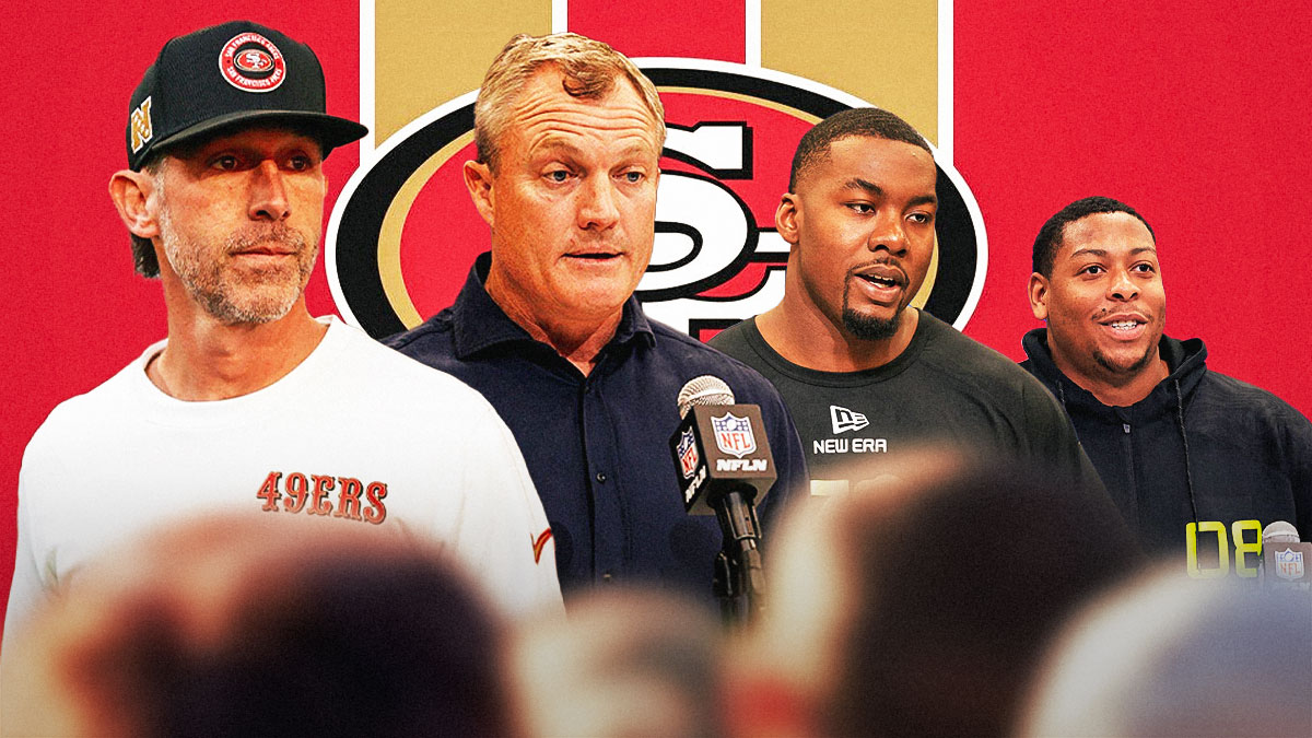 Coach Kyle Shanahan, GM John Lynch, Mykel Williams, Alfred Collins beside each other, San Francisco 49ers wallpaper in the background