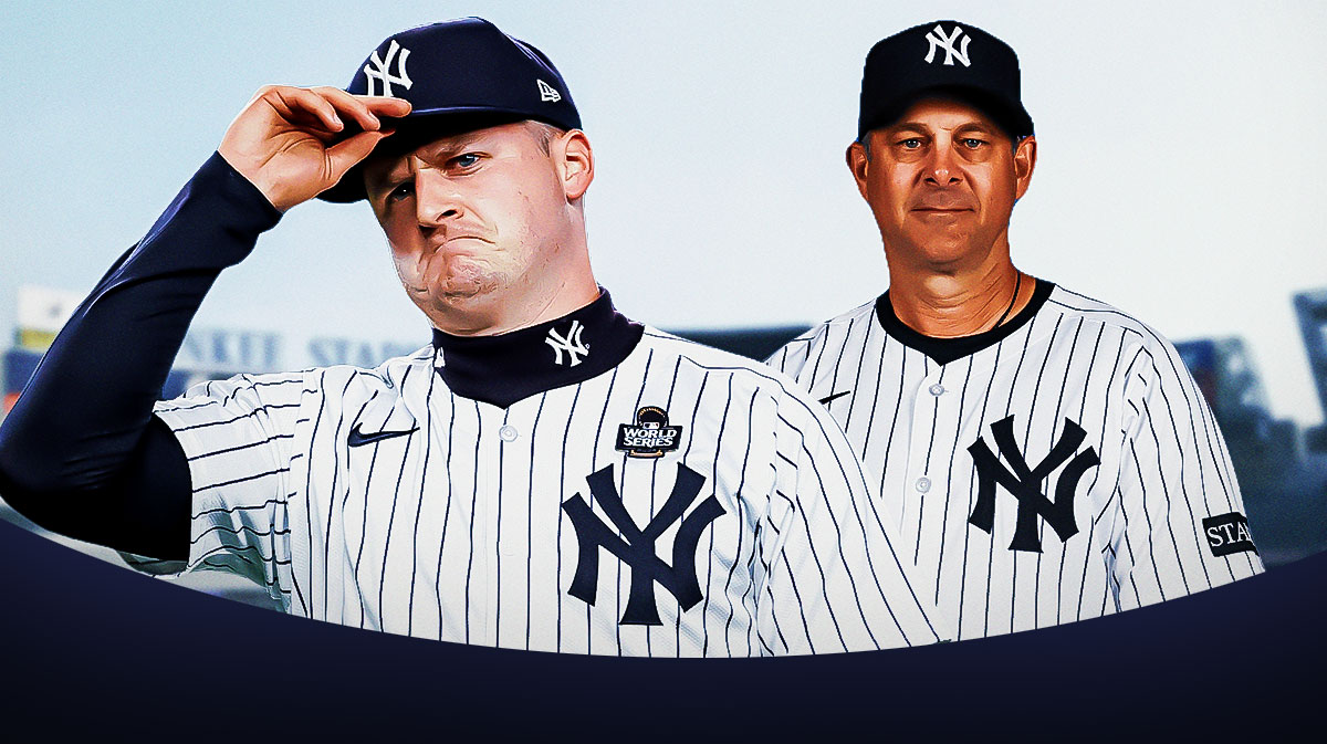 Clarke Schmidt and Aaron Boone