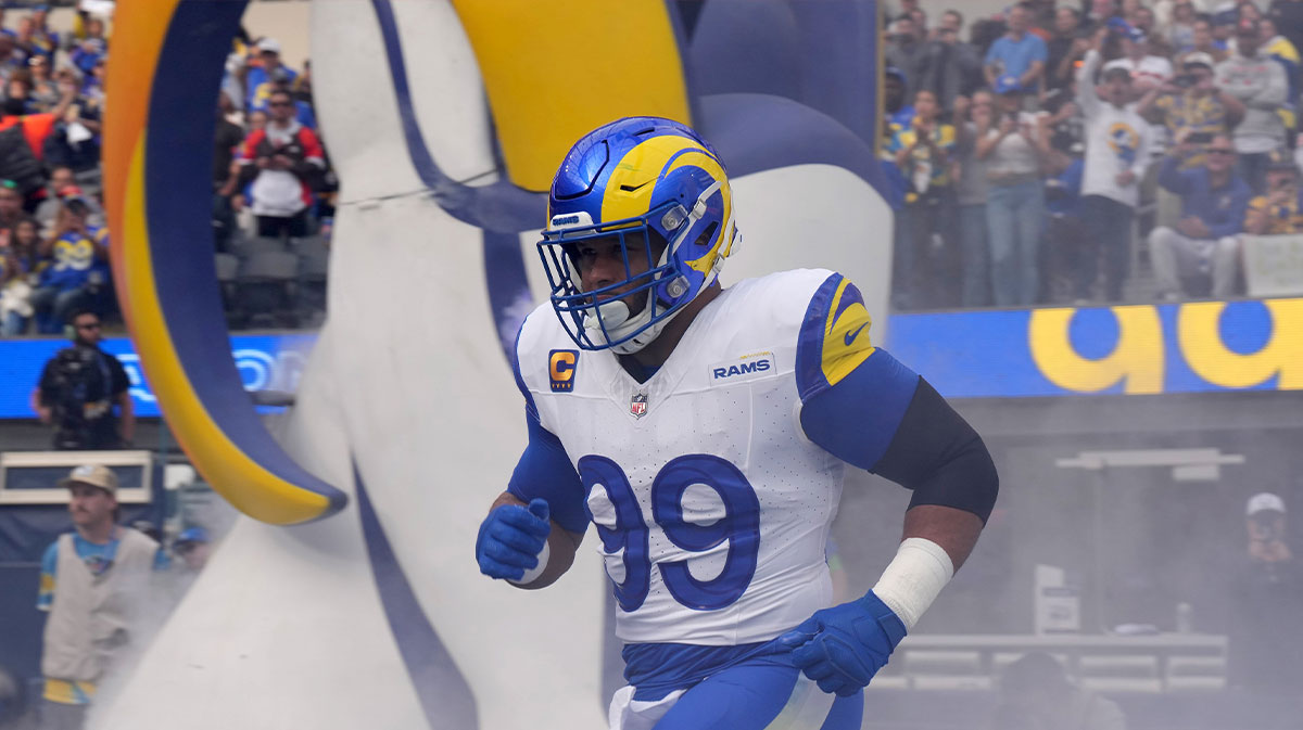 Los Angeles Rams defensive tackle Aaron Donald (99) enters the field before the game against the Cleveland Browns at SoFi Stadium.
