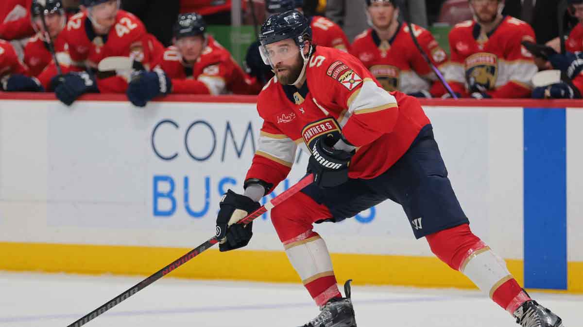 Florida Panthers defenseman Aaron Ekblad (5) moves the puck against the Tampa Bay Lightning during the second period at Amerant Bank Arena.