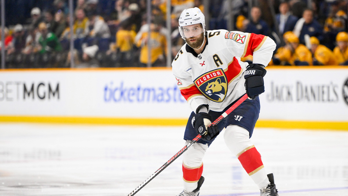 Florida Panthers defenseman Aaron Ekblad (5) skates with the puck against the Nashville Predators during the second period at Bridgestone Arena.