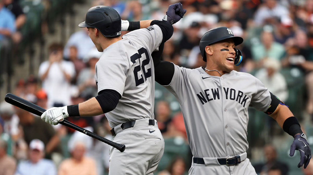 New York Yankees outfielder Aaron Judge (99) celebrates with New York Yankees first baseman Ben Rice (22) after hitting a home run during the first inning against the Baltimore Orioles at Oriole Park at Camden Yards