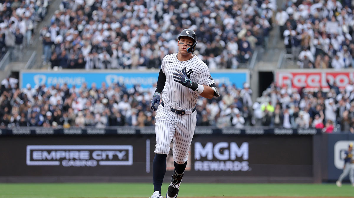 New York Yankees right fielder Aaron Judge (99) rounds the bases after hitting a two run home run against the Milwaukee Brewers during the first inning at Yankee Stadium.
