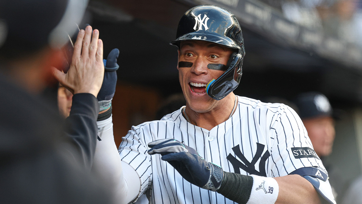 New York Yankees right fielder Aaron Judge (99) celebrates his solo home run during the sixth inning with teammates against the Toronto Blue Jays at Yankee Stadium