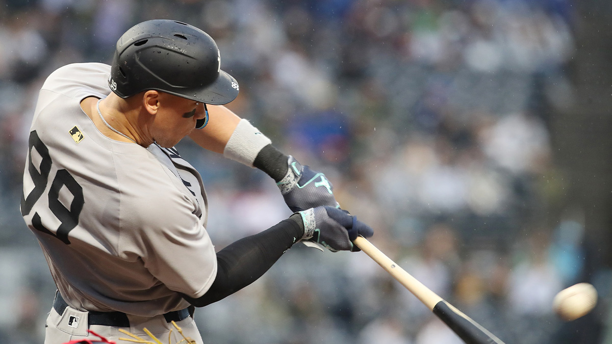 New York Yankees right fielder Aaron Judge (99) hits a single against the Pittsburgh Pirates during the ninth inning at PNC Park.