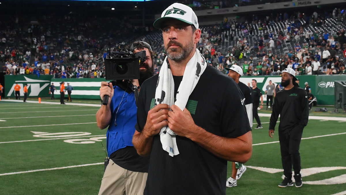 New York Jets quarterback Aaron Rodgers (8) walks on the field following the game against the New York Giants at MetLife Stadium.