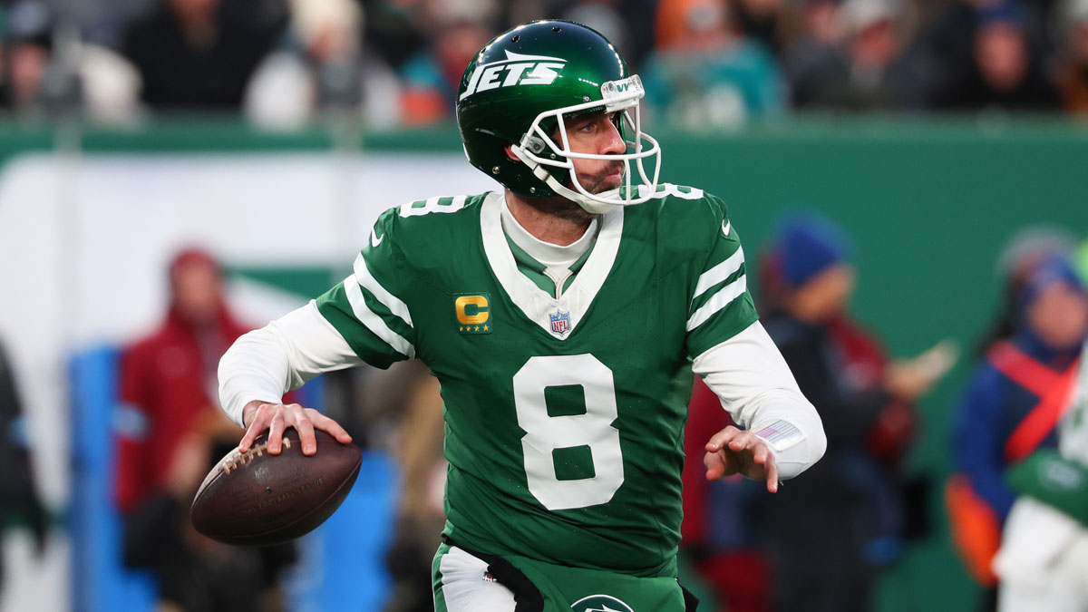 New York Jets quarterback Aaron Rodgers (8) throws a pass during the first quarter of their game against the Miami Dolphins at MetLife Stadium.