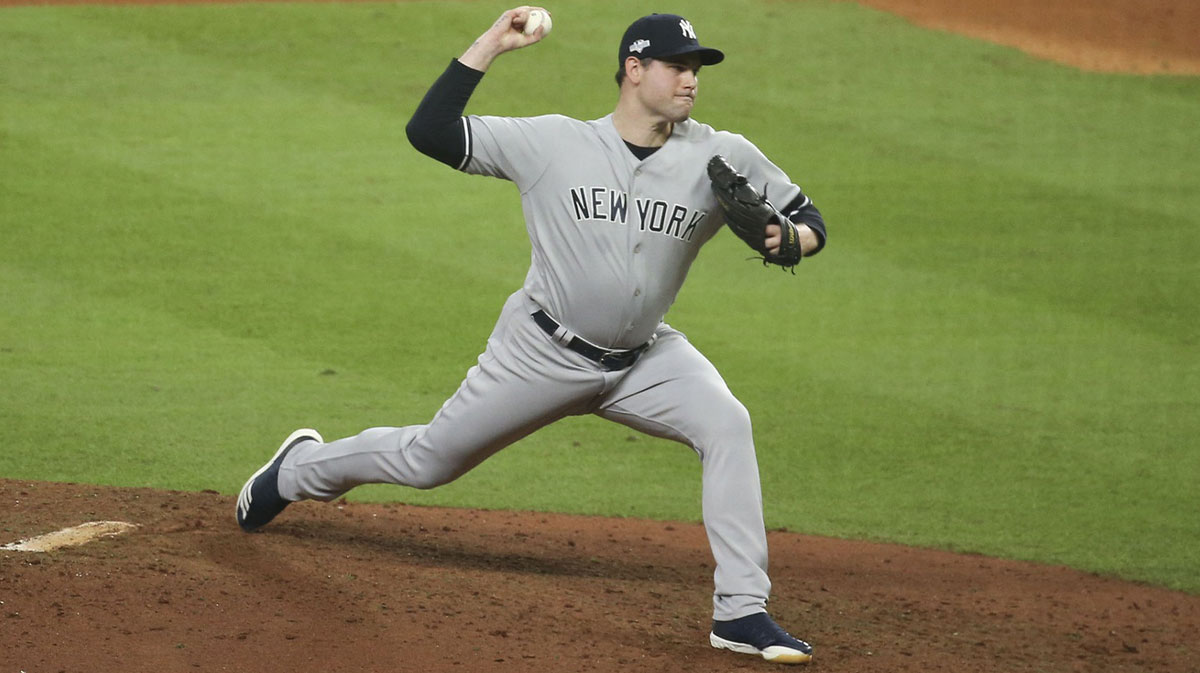 New York Yankees relief pitcher Adam Ottavino (0) pitches in the fifth inning in game two of the 2019 ALCS playoff baseball series against the Houston Astros at Minute Maid Park.