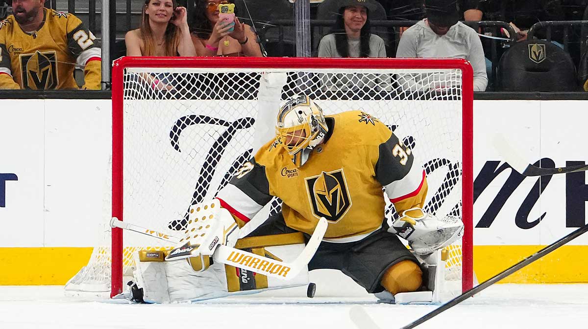 Vegas Golden Knights goaltender Adin Hill (33) makes a save against the Seattle Kraken during the second period at T-Mobile Arena.