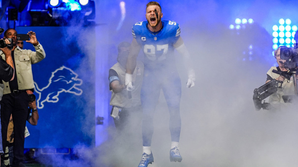 Detroit Lions Aidan Hutchinson (97) runs out of the tunnel during the Detroit Lions season opener against the Los Angeles Rams at Ford Field in Detroit, on Sunday, Sept. 8. 2024.