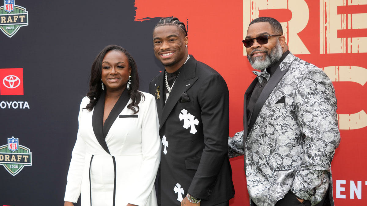 Alabama Crimson Tide quarterback Jalen Milroe with his parents Quentin Milroe and Lola Milroe on the red carpet before the 2025 NFL Draft at Lambeau Field.