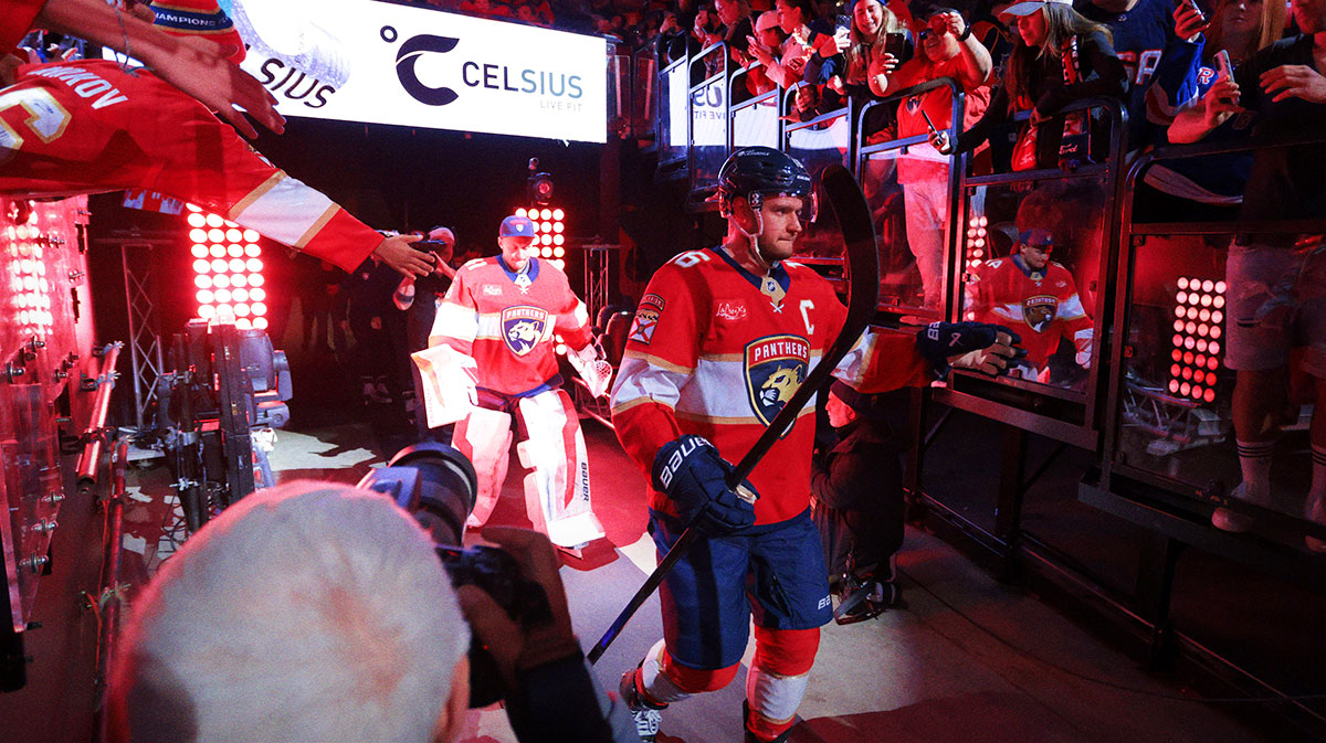 Florida Panthers center Aleksander Barkov (16) enters the rink before the game against the New York Rangers at Amerant Bank Arena.
