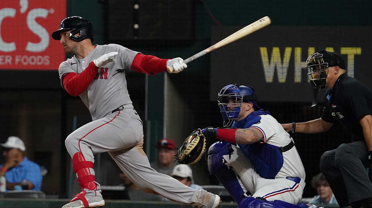 Boston Red Sox third base Alex Bregman (2) singles during the seventh inning against the Texas Rangers at Globe Life Field.
