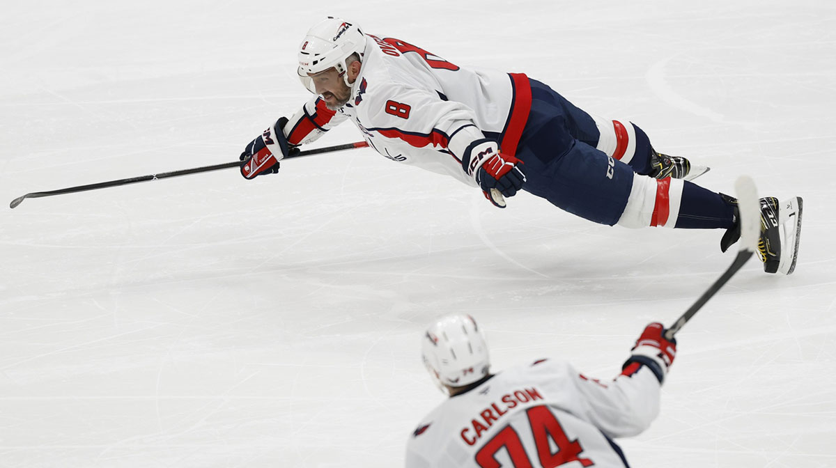 Washington Capitals left wing Alex Ovechkin (8) scores a goal in the 2nd period against the New York Islanders at UBS Arena. The goal is the 895th of Ovechkin’s career, breaking the NHL all-time career goals record previously held by Wayne Gretzky.at UBS Arena.