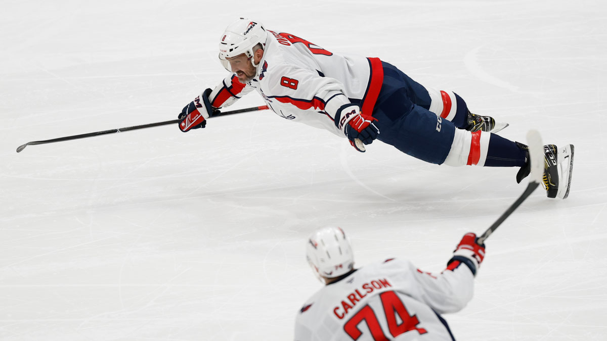 Washington Capitals left wing Alex Ovechkin (8) scores a goal in the 2nd period against the New York Islanders at UBS Arena. The goal is the 895th of Ovechkin’s career, breaking the NHL all-time career goals record previously held by Wayne Gretzky.at UBS Arena.
