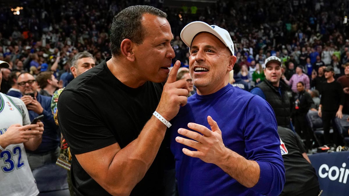 Minnesota Timberwolves co-minority owners Alex Rodriguez and Marc Lore celebrate a victory over the Los Angeles Clippers after a play-in game at Target Center. Mandatory Credit: Nick Wosika-Imagn Images