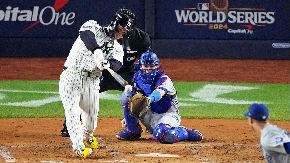 Oct 30, 2024; New York, New York, USA; New York Yankees outfielder Alex Verdugo (24) hits an RBI single during the second inning against the Los Angeles Dodgers in game four of the 2024 MLB World Series at Yankee Stadium.