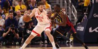 Houston Rockets center Alperen Sengun (28) controls the ball against Golden State Warriors forward Draymond Green (23) during the second quarter of game four of the 2025 NBA Playoffs first round at Chase Center.