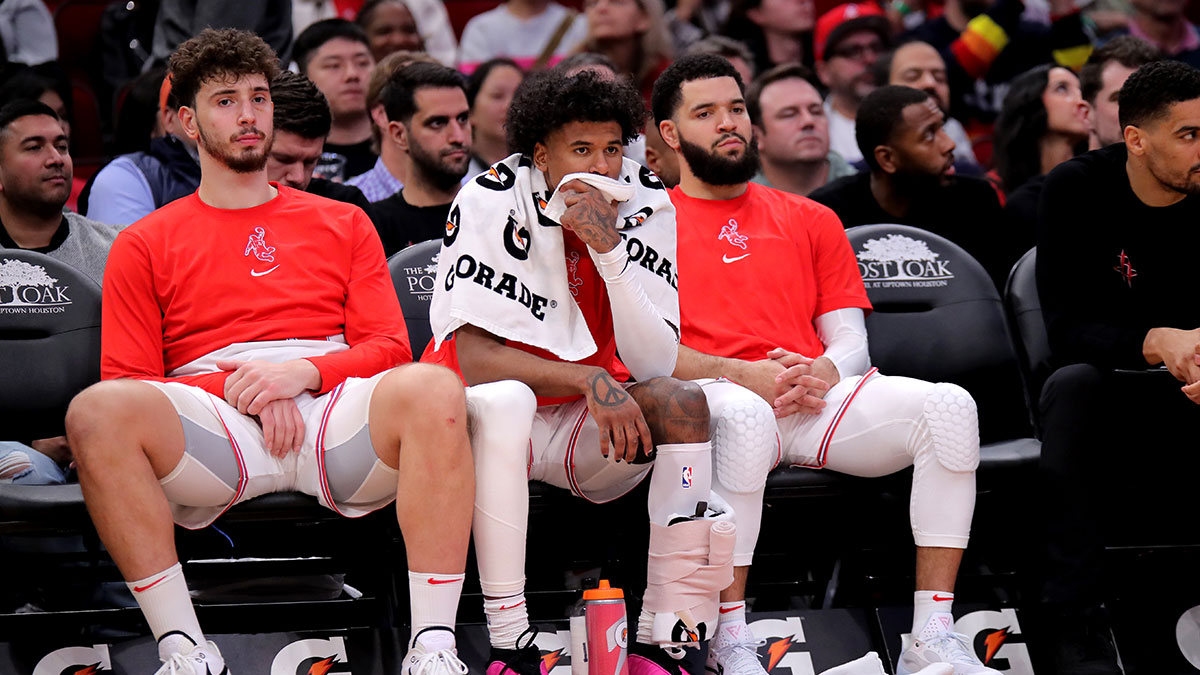 Houston Rockets center Alperen Sengun (28), Houston Rockets guard Jalen Green (4) and Houston Rockets guard Fred VanVleet (5) sit on the bench during the fourth quarter against the Phoenix Suns at Toyota Center.