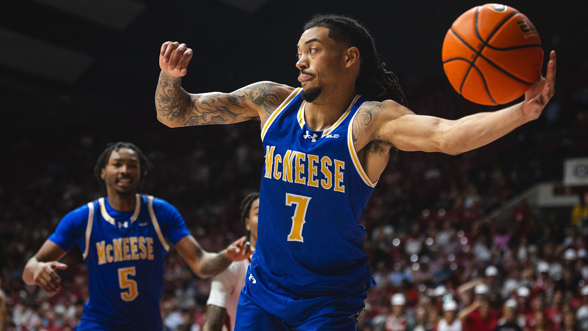 McNeese State Cowboys guard Alyn Breed (7) goes to pass against the Alabama Crimson Tide during the first half at Coleman Coliseum.