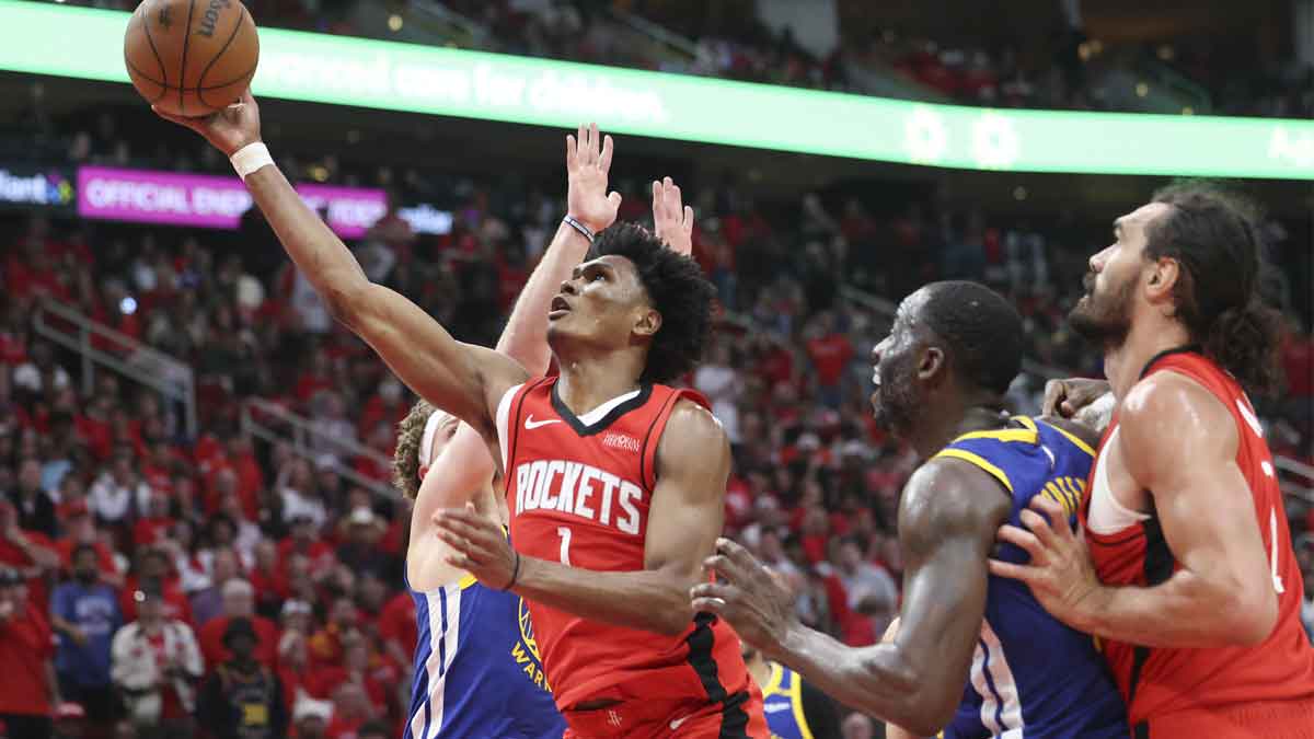 Houston Rockets forward Amen Thompson (1) shoots the ball during the fourth quarter against the Golden State Warriors at Toyota Center.
