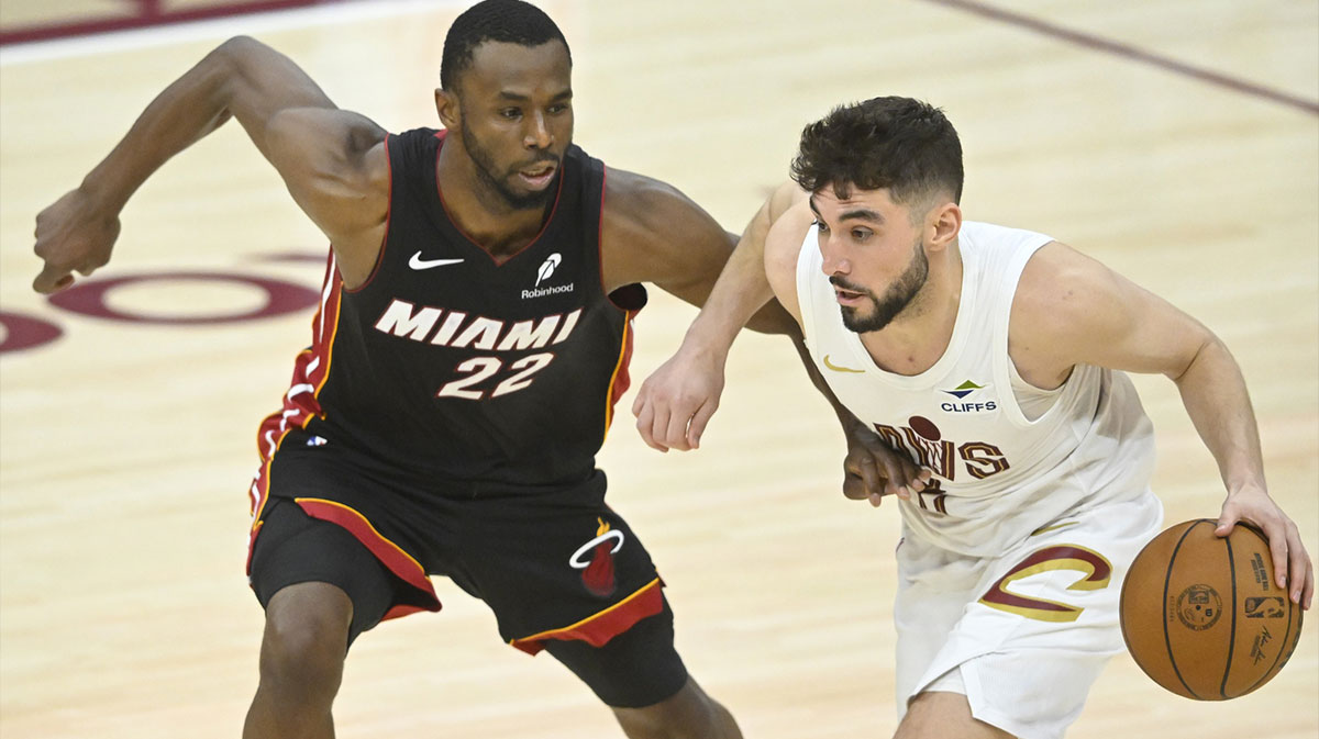 Miami Heat forward Andrew Wiggins (22) defends Cleveland Cavaliers guard Ty Jerome (2) in the third quarter of game two of the first round of the 2025 NBA Playoffs at Rocket Arena.