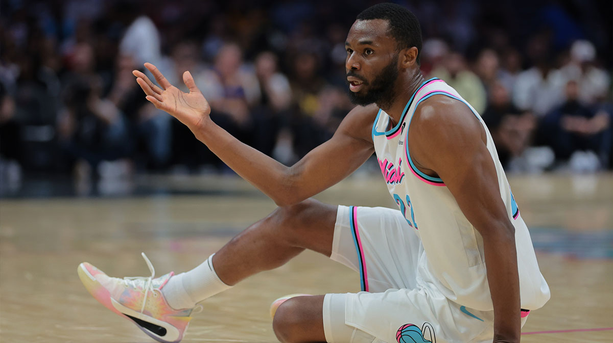 Miami Heat forward Andrew Wiggins (22) reacts after shooting the basketball against the Golden State Warriors during the third quarter at Kaseya Center.