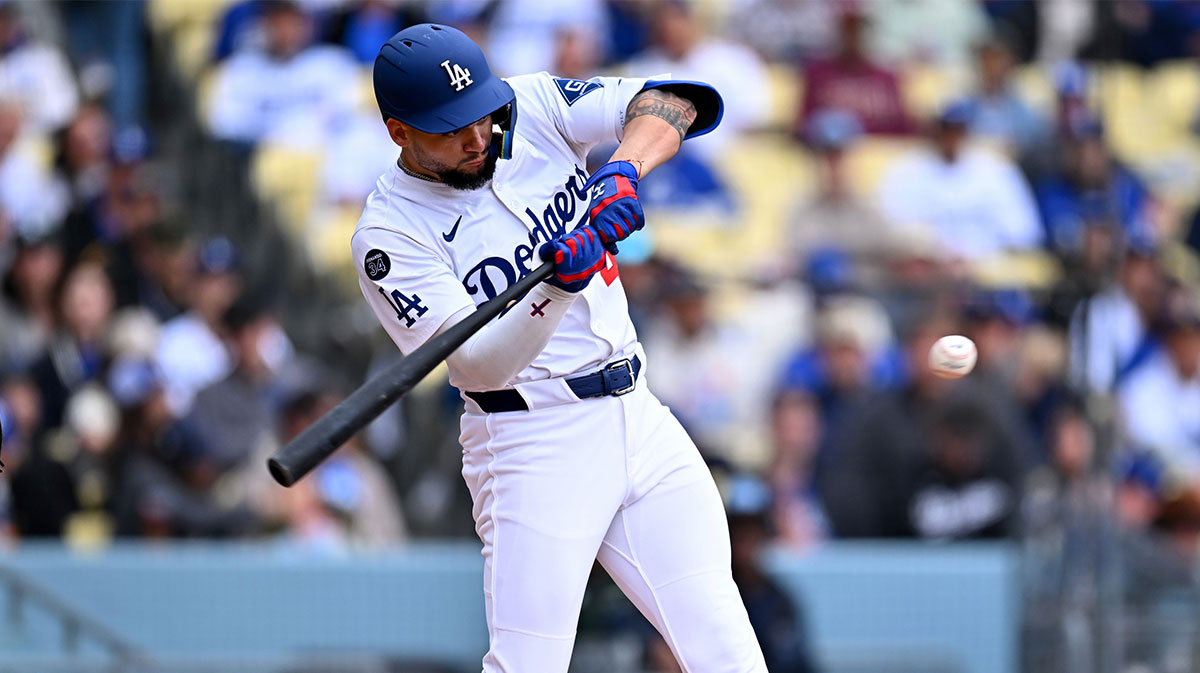 Los Angeles Dodgers outfielder Andy Pages (44) hits a RBI single during the first inning against the Pittsburgh Pirates at Dodger Stadium. Mandatory Credit: Jonathan Hui-Imagn Images