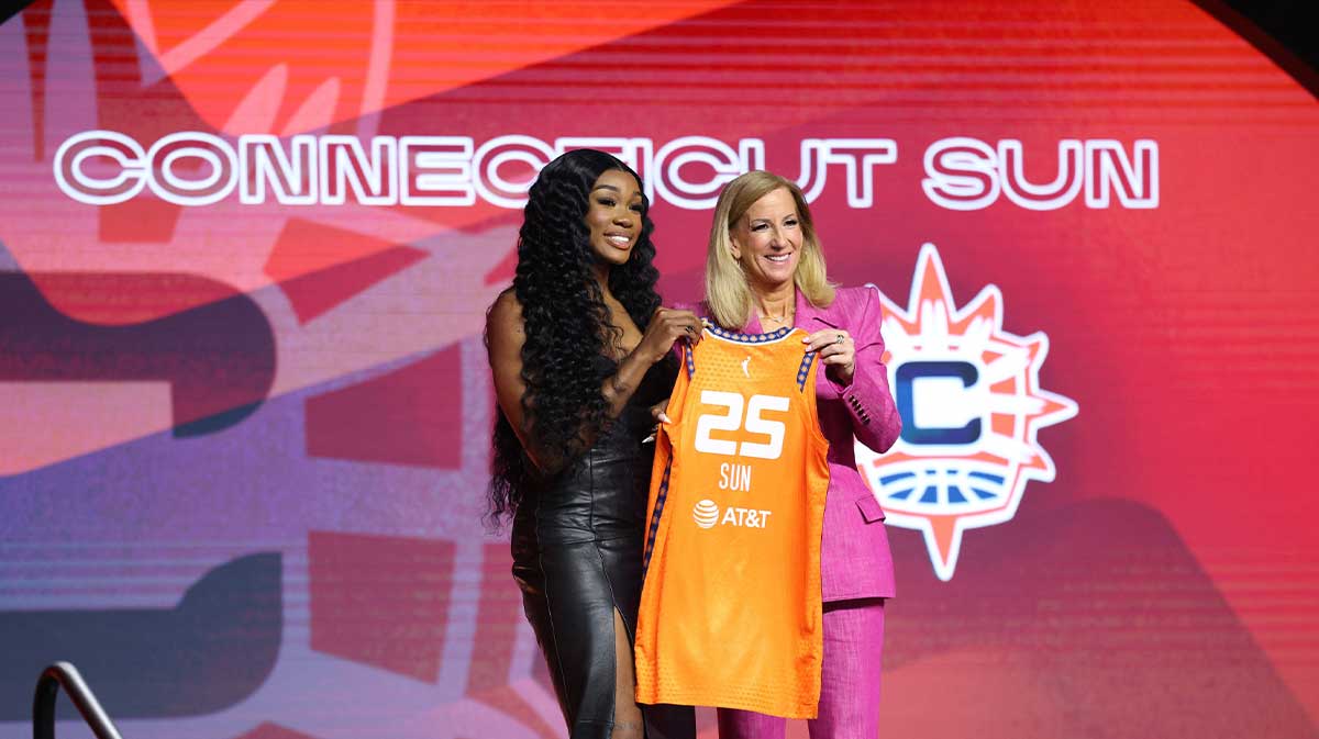 Sun's Aneesah Morrow poses with WNBA commissioner Cathy Engelbert after being selected with the number seven overall pick to the Connecticut Sun in the 2025 WNBA Draft at The Shed at Hudson Yards.