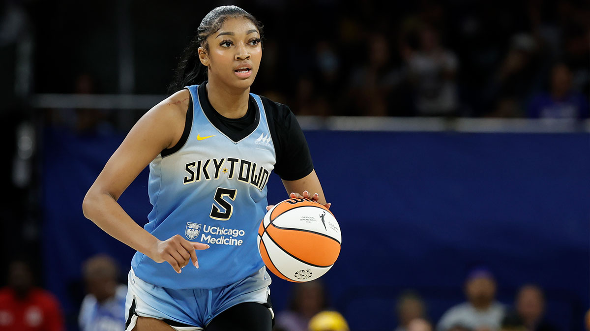 Team WNBA guard Caitlin Clark (22) dribbles alongside Team WNBA forward Angel Reese (5) against USA Women's National Team during the WNBA All Star Game at Footprint Center.