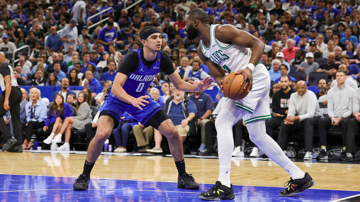 Orlando Magic guard Anthony Black (0) defends Boston Celtics guard Jaylen Brown (7) during the second quarter of game three of first round for the 2025 NBA Playoffs at Kia Center.