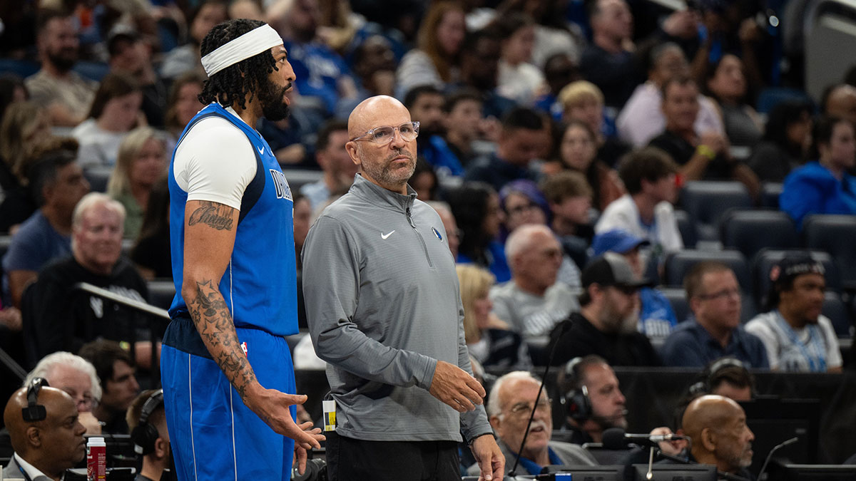 Dallas Mavericks forward-center Anthony Davis (3) and head coach Jason Kidd talking during a substitution against the Orlando Magic in the second quarter at Kia Center.