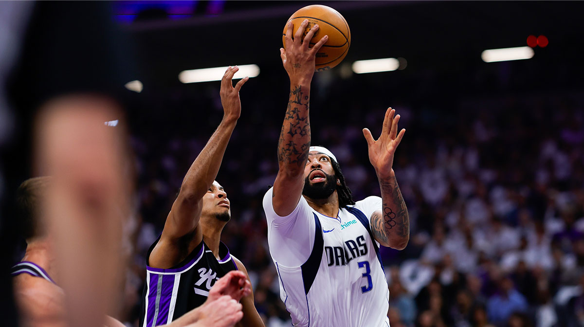 Dallas Mavericks forward Anthony Davis (3) drives to the basket against Sacramento Kings forward Keegan Murray (13) during the first quarter at Golden 1 Center.
