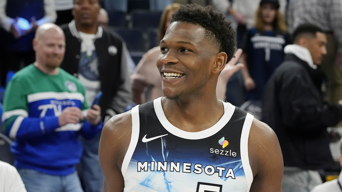 Minnesota Timberwolves guard Anthony Edwards (5) smiles after the game against the Brooklyn Nets at Target Center.