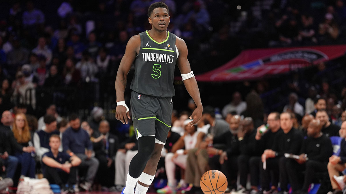 Minnesota Timberwolves guard Anthony Edwards (5) controls the ball against the Philadelphia 76ers in the third quarter at Wells Fargo Center.