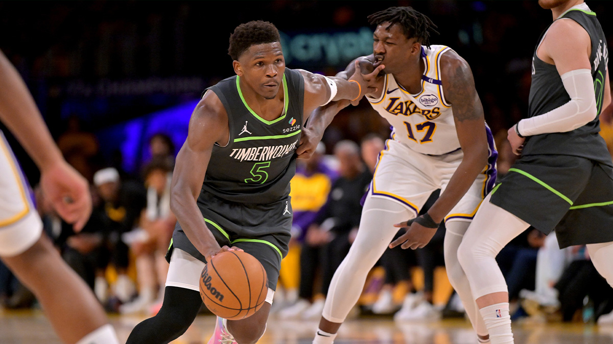 Minnesota Timberwolves guard Anthony Edwards (5) drives past Los Angeles Lakers forward Dorian Finney-Smith (17) in the second half at Crypto.com Arena.