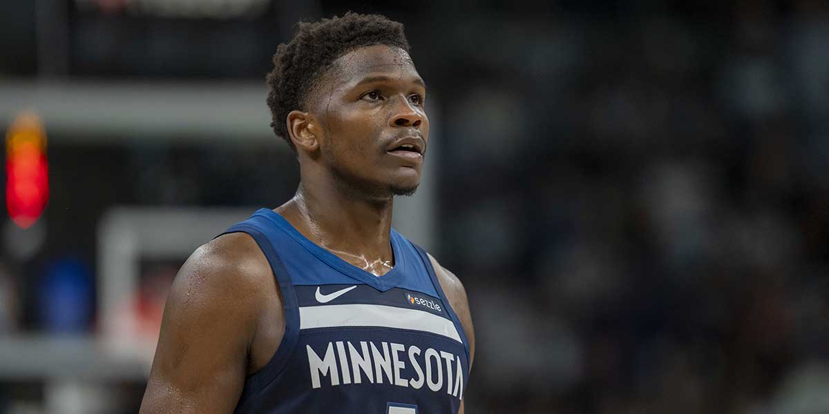 Timberwolves’ Anthony Edwards suffers injury scare after LeBron James dives into him