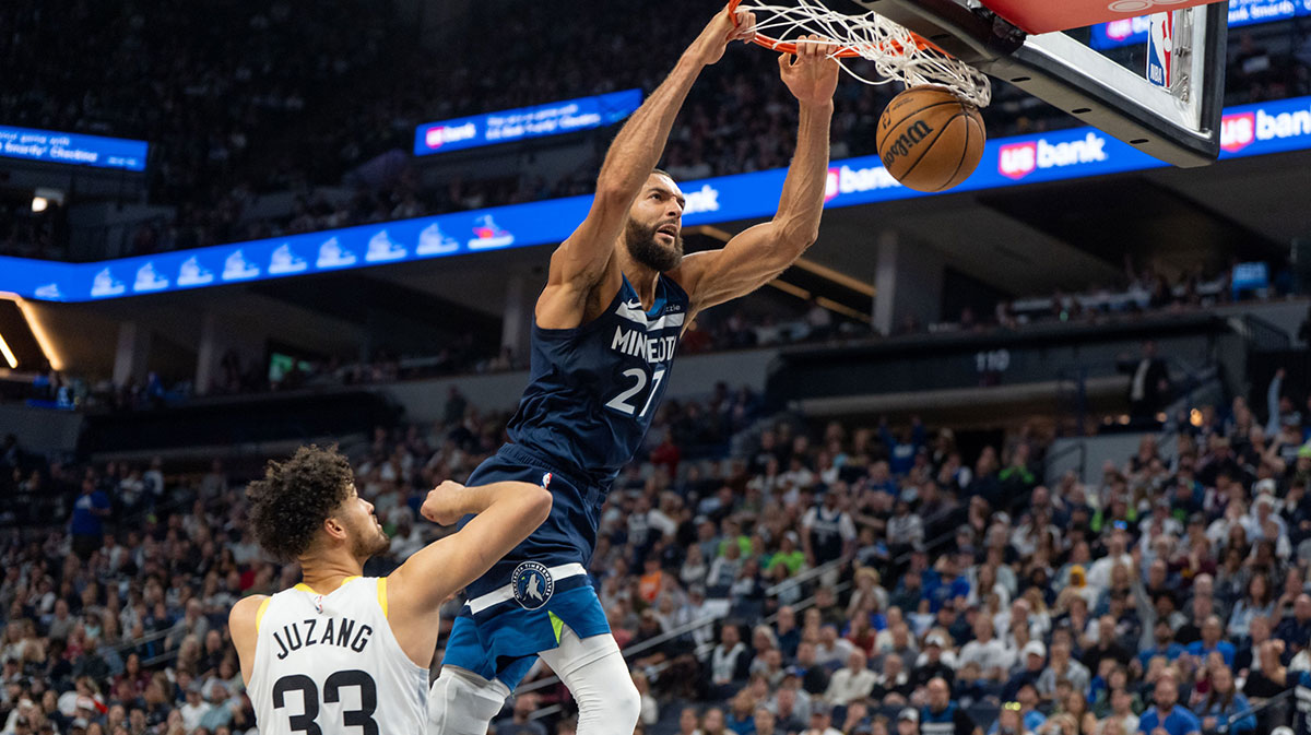 Minnesota Timberwolves center Rudy Gobert (27) dunks over Utah Jazz guard Johnny Juzang (33) in the second quarter at Target Center.