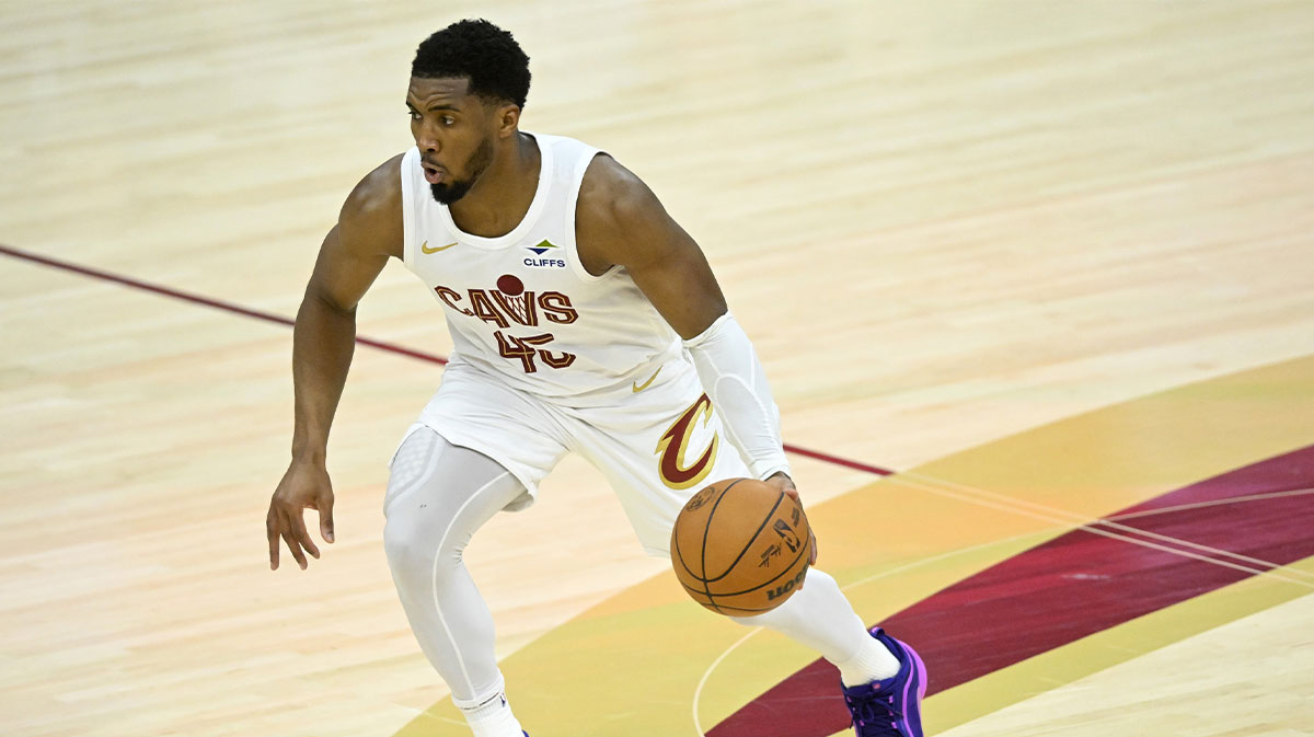 Cleveland Cavaliers guard Donovan Mitchell (45) brings the ball up court in the third quarter against the Miami Heat at Rocket Arena.