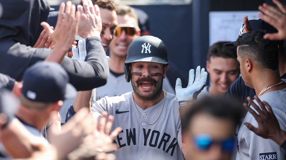 New York Yankees catcher Austin Wells (28) celebrates after hitting a home run against the Tampa Bay Rays in the ninth inning at George M. Steinbrenner Field.