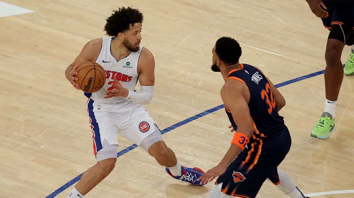Detroit Pistons guard Cade Cunningham (2) controls the ball against New York Knicks center Karl-Anthony Towns (32) during the first quarter of game two of first round of the 2024 NBA Playoffs at Madison Square Garden.