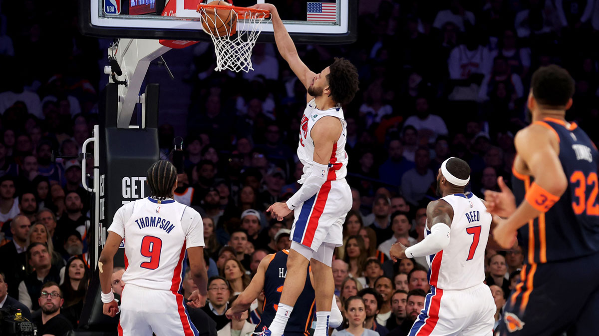 Detroit Pistons guard Cade Cunningham (2) dunks against New York Knicks guard Josh Hart (3) during the third quarter of game two of the first round of the 2024 NBA Playoffs at Madison Square Garden.