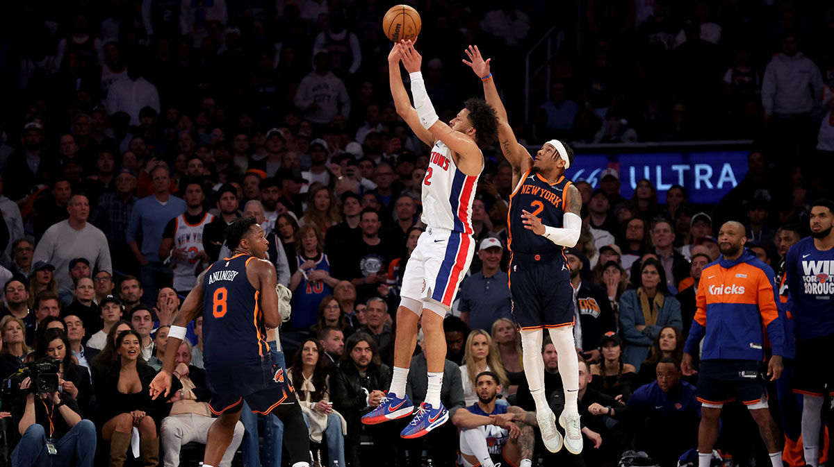 Detroit Pistons guard Cade Cunningham (2) takes a shot against New York Knicks forward OG Anunoby (8) and guard Miles McBride (2) during the third quarter of game two of the first round of the 2024 NBA Playoffs at Madison Square Garden.