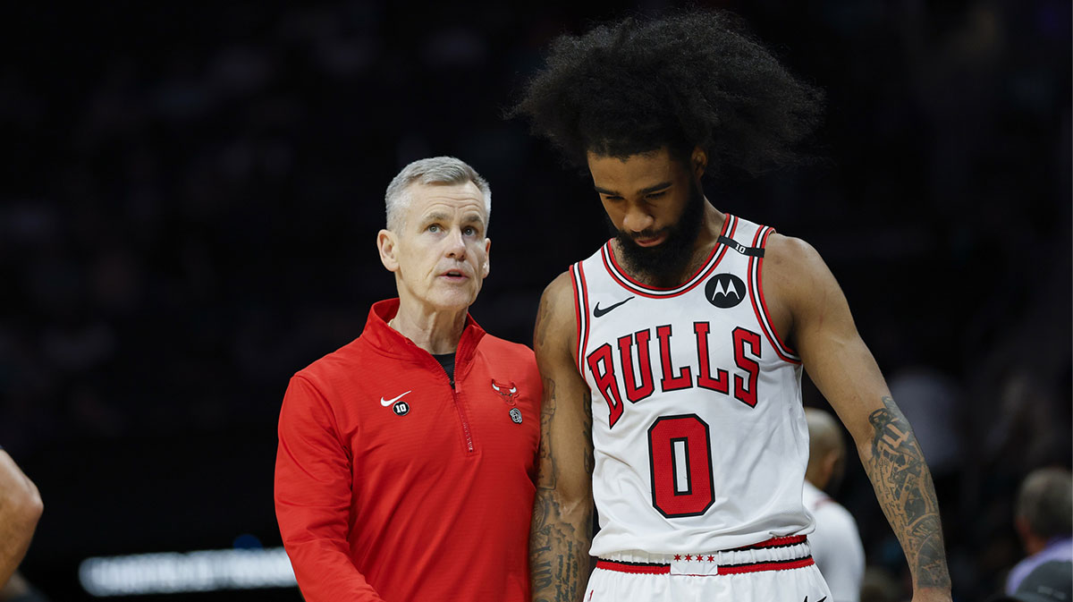 Chicago Bulls head coach Billy Donovan talks to guard Coby White (0) during the second half against the Charlotte Hornets at Spectrum Center.