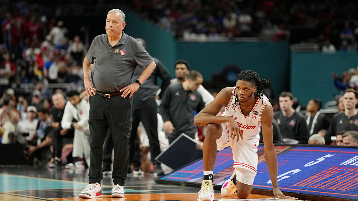Houston Cougars head coach Kelvin Sampson and forward Joseph Tugler (11) look on against the Florida Gators during the second half of the national championship game of the Final Four of the 2025 NCAA Tournament at the Alamodome.