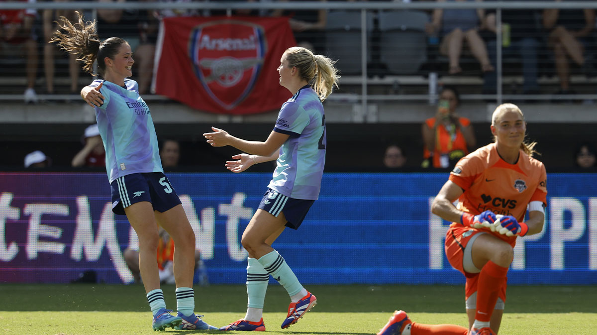 Arsenal FC forward Alessia Russo (23) celebrates with Arsenal FC forward Freya Godfrey (56) after scoring a goal on Washington Spirit goalkeeper Aubrey Kingsbury (1) in the second half at Audi Field.