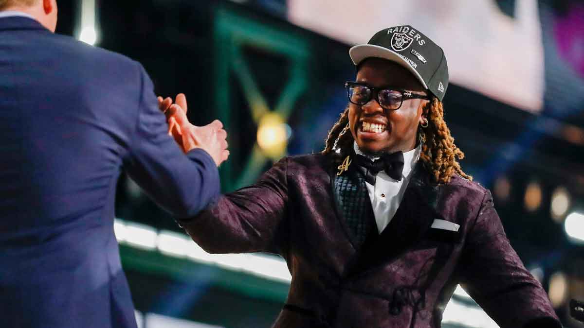 Running back Ashton Jeanty slaps hands with NFL Commissioner Roger Goodell after being selected sixth overall by the Las Vegas Raiders during the first round of the 2025 NFL Draft on Thursday, April 24, 2025, at Lambeau Field in Green Bay, Wisconsin. The draft runs through April 26. Tork Mason/USA TODAY NETWORK-Wisconsin