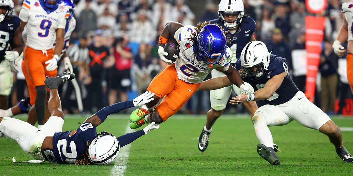 Boise State Broncos running back Ashton Jeanty (2) rushes the ball against the Penn State Nittany Lions during the second half in the Fiesta Bowl at State Farm Stadium. Mandatory Credit: Mark J. Rebilas-Imagn Images